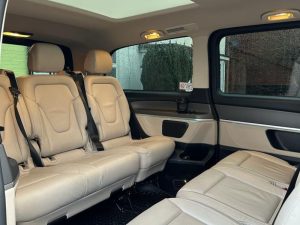 Luxury interior of Friends Cars taxi, equipped with modern amenities for comfort.